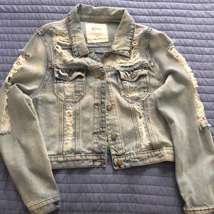 Women’s distressed denim jacket